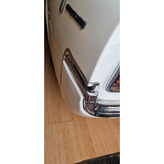 Set left and right end strips, rear bumper COUPE only, stainless steel.